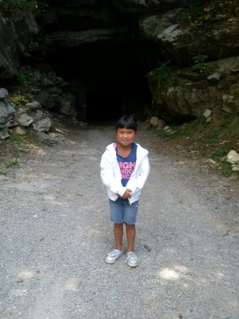 Kasen at entrance of Cumberland Caverns
